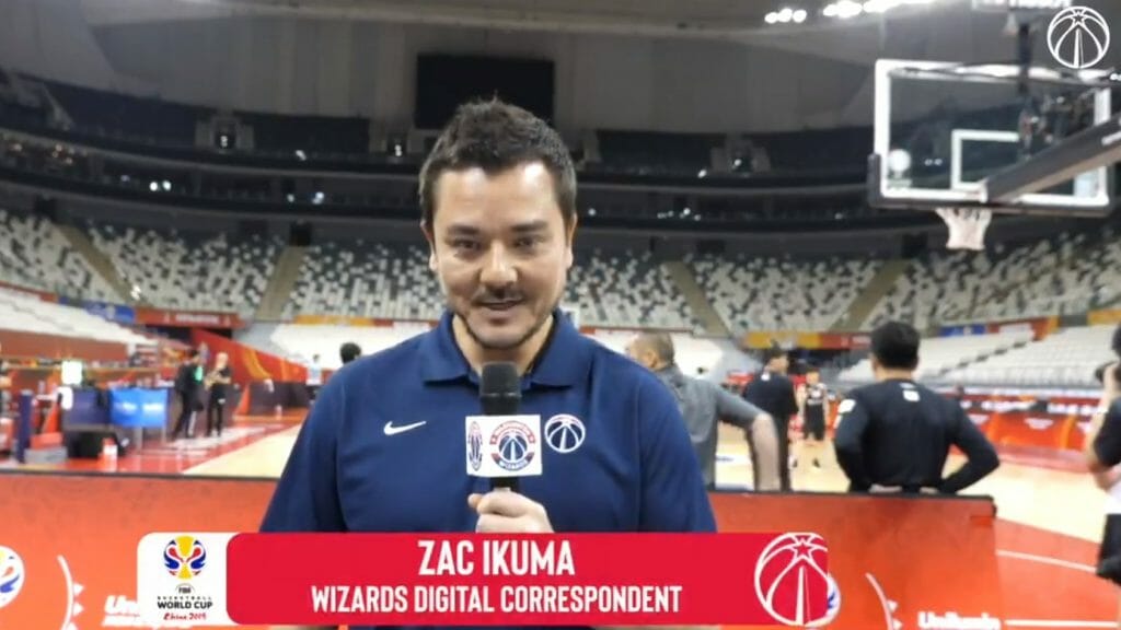 Screen grab of Zac Ikuma as he interviews players at the FIBA games in China